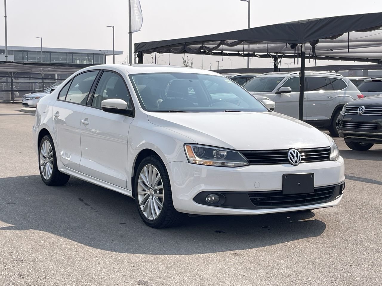 Used 2011 Candy White Volkswagen Sportline image 16