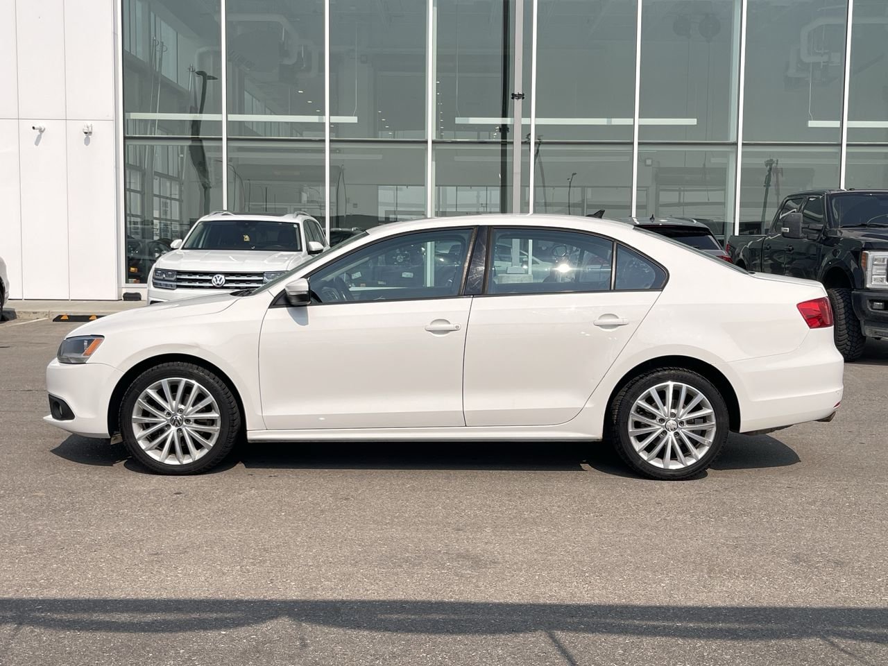 Used 2011 Candy White Volkswagen Sportline image 5