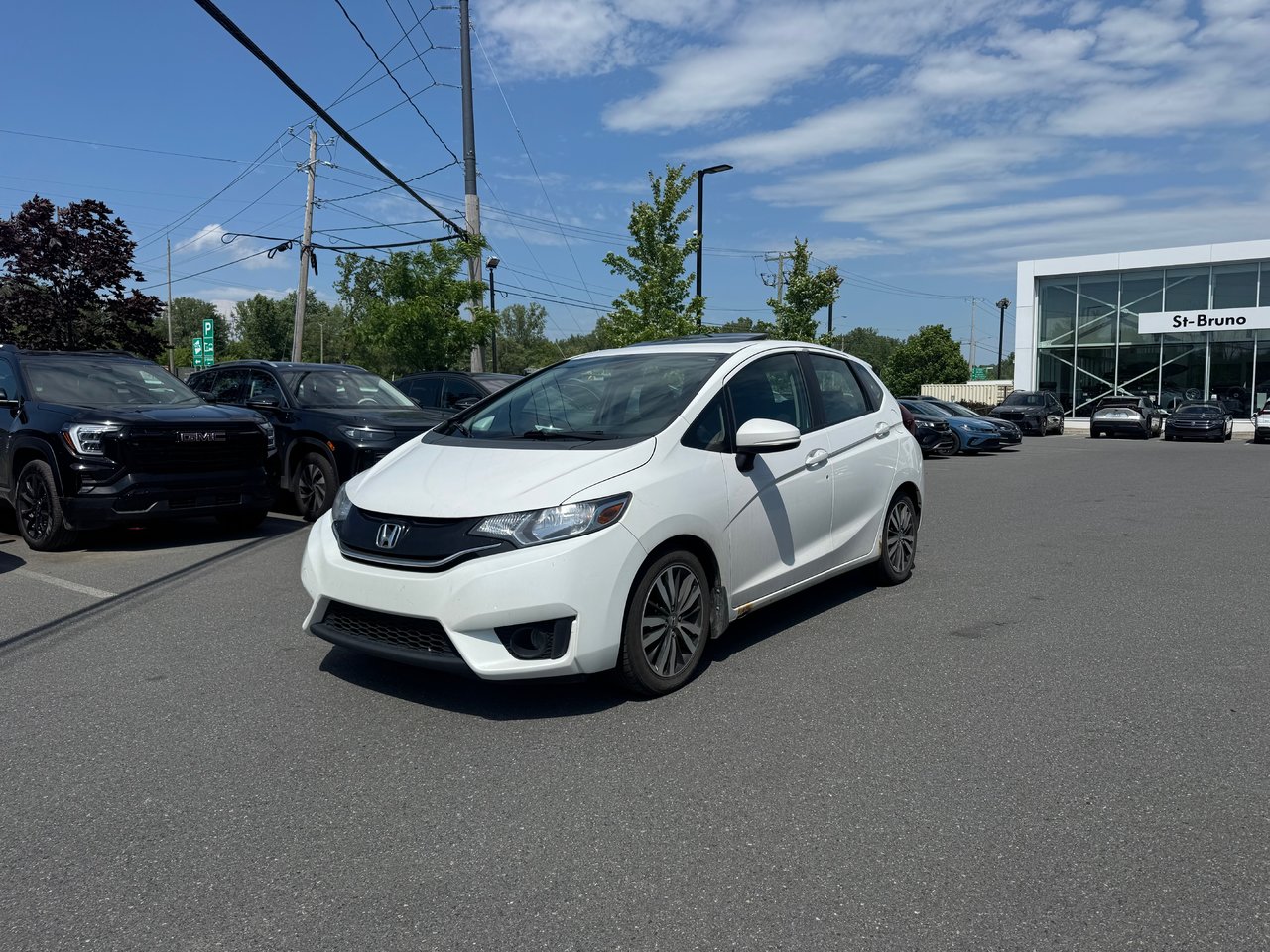 White 2016 Honda Fit Hatchback Front-Wheel Drive Continuously Variable Transmission