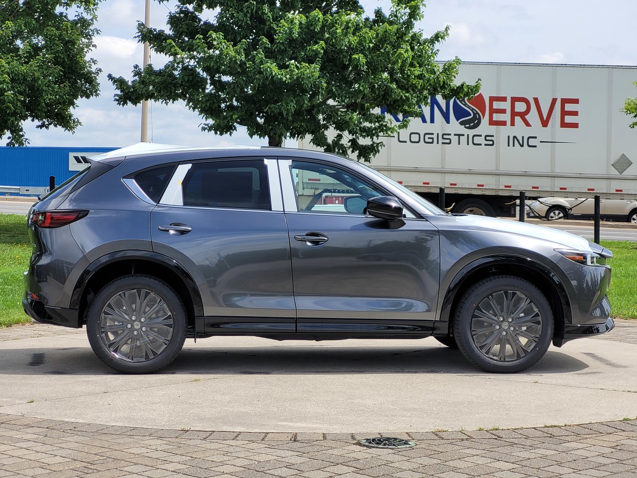New 2023 Machine Grey Metallic Mazda Sport Design image 6