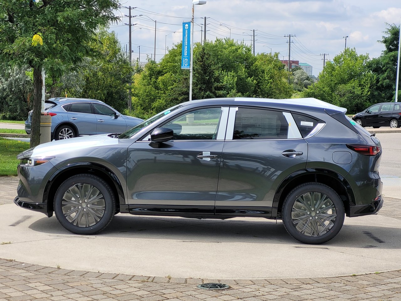 New 2023 Machine Grey Metallic Mazda Sport Design image 2