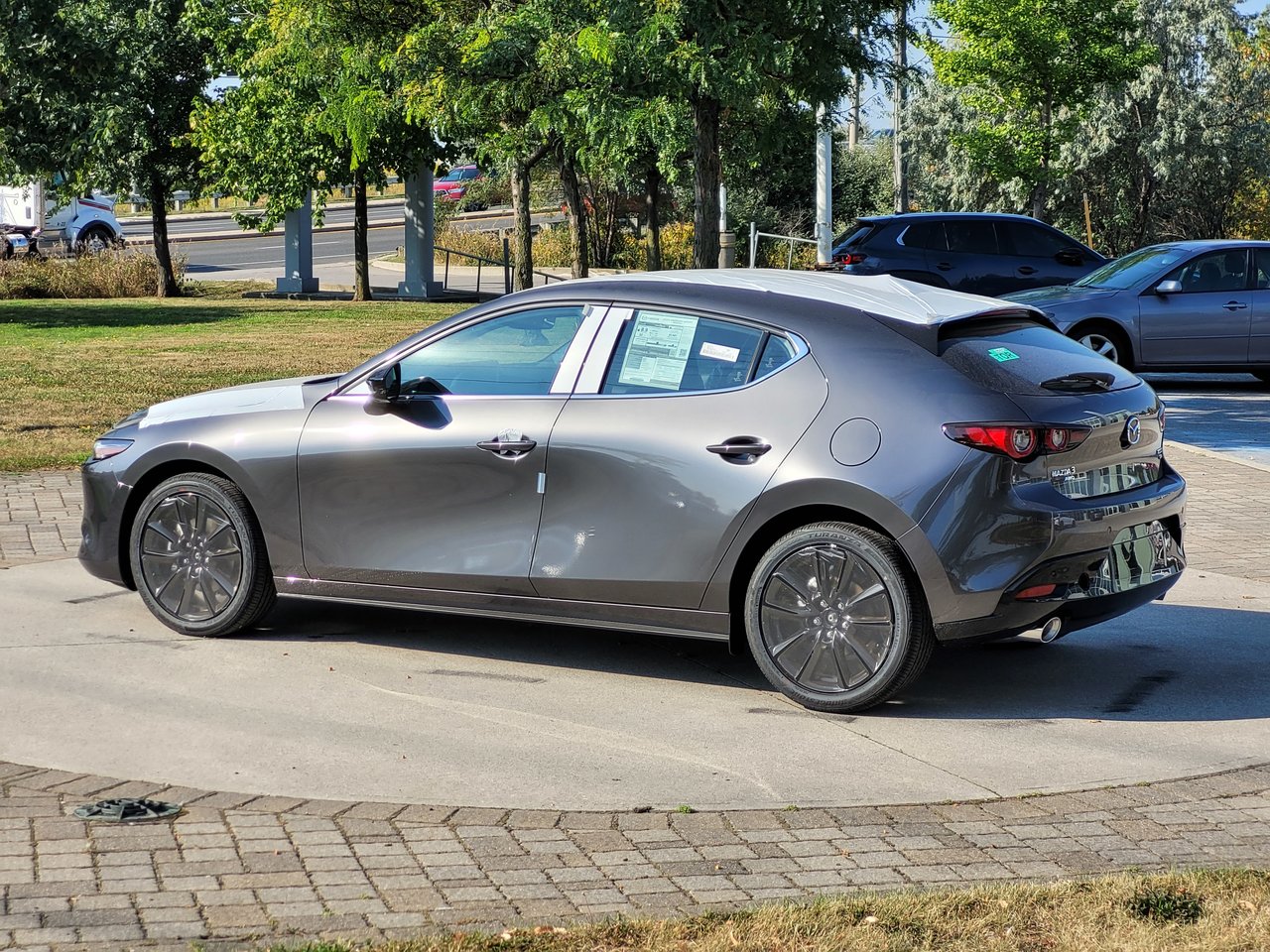 New 2024 Machine Grey Metallic Mazda GT image 3
