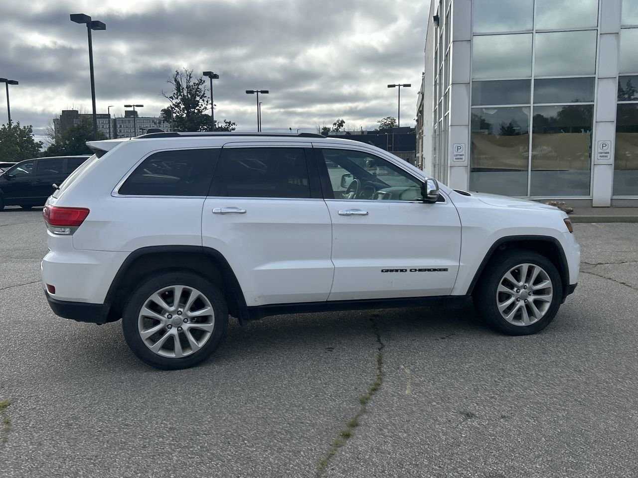 Certified Used 2017 Bright White Jeep Limited image 13