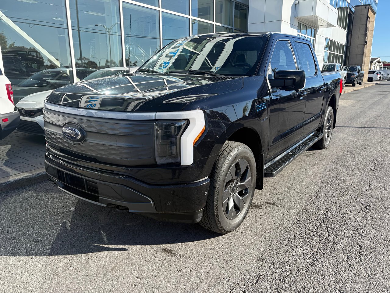 Agate Black Metallic 2023 Ford F-150 Lightning Pickup Truck All-Wheel Drive Automatic