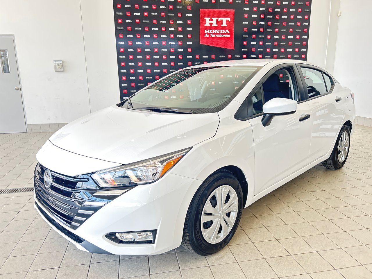 White 2024 Nissan Versa S FWD Sedan Front-Wheel Drive Continuously Variable Transmission