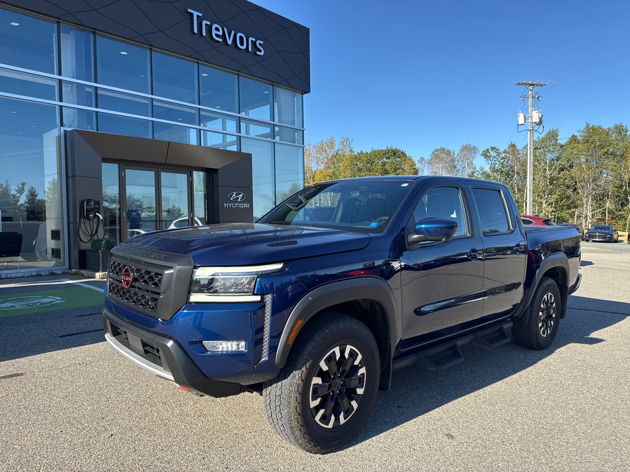 Blue 2023 Nissan Frontier Pickup Truck Four-Wheel Drive Automatic