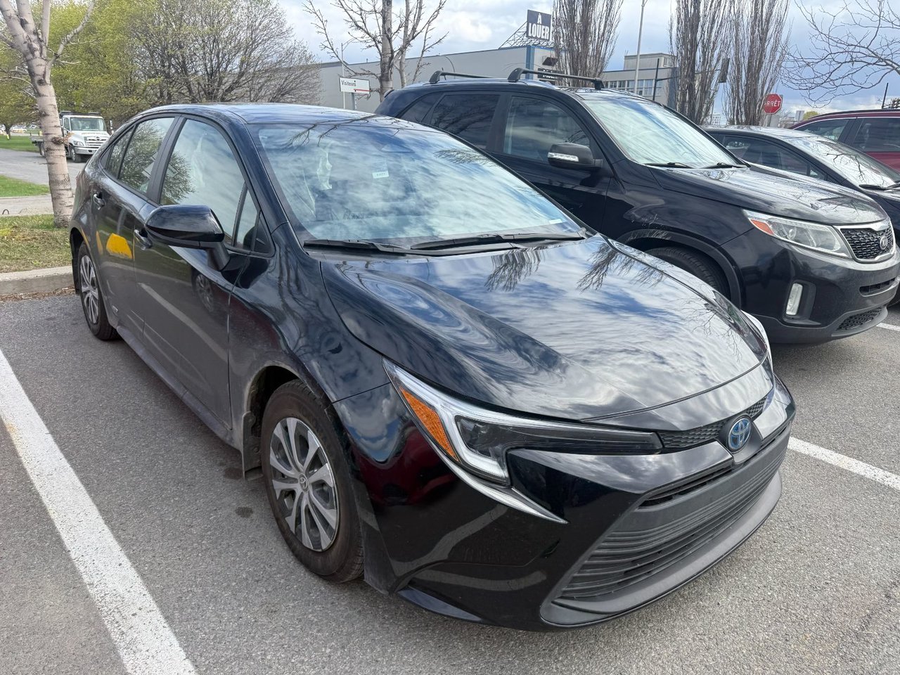 Midnight Black Metallic 2025 Toyota Corolla Hybrid LE AWD Sedan All-Wheel Drive Continuously Variable Transmission