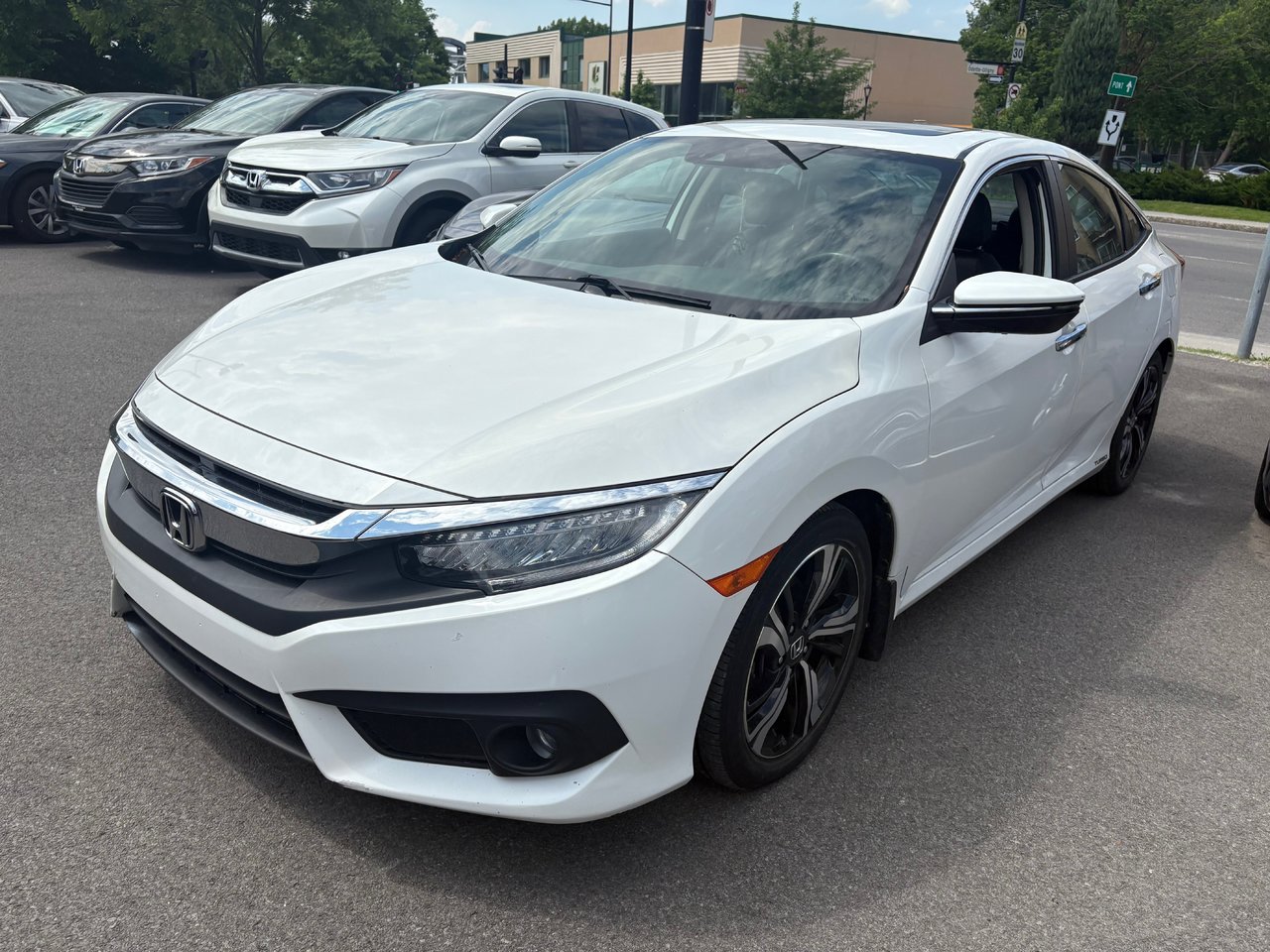 White Orchid Pearl 2018 Honda Civic Touring Sedan Front-Wheel Drive Automatic