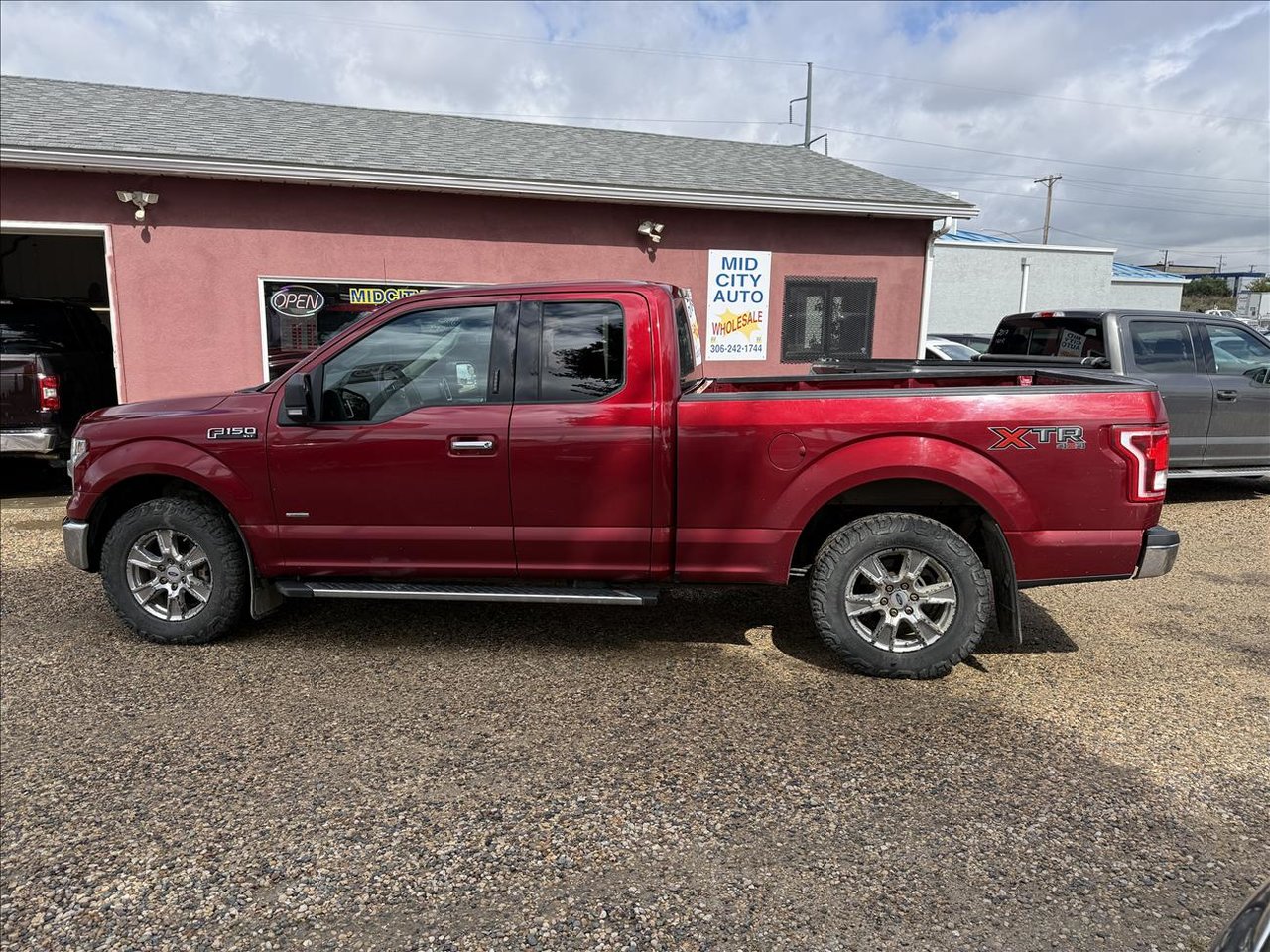 Red 2015 Ford F-150 Pickup Truck Four-Wheel Drive Automatic