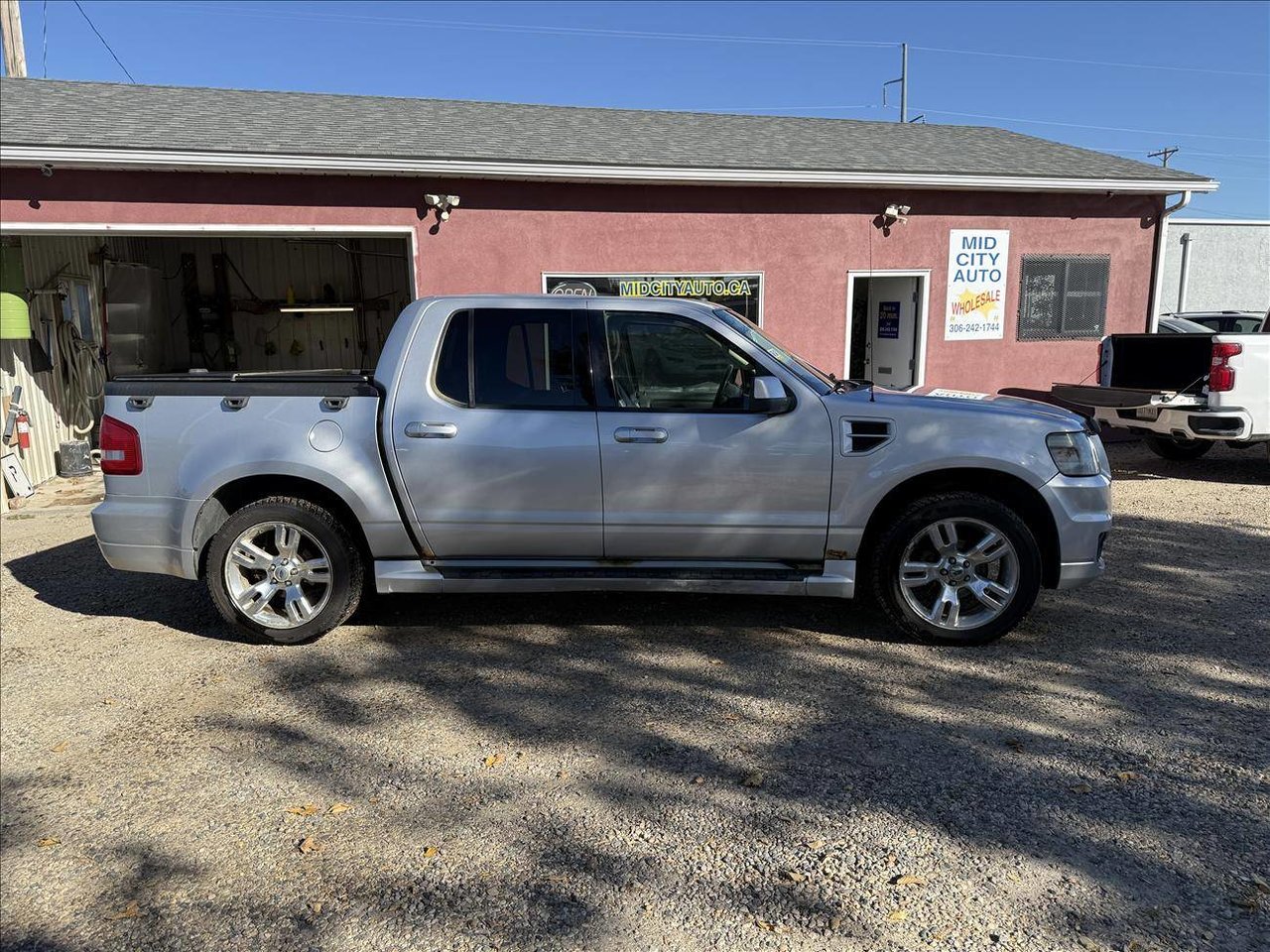 Silver 2010 Ford Explorer Sport Trac Pickup Truck All-Wheel Drive Automatic