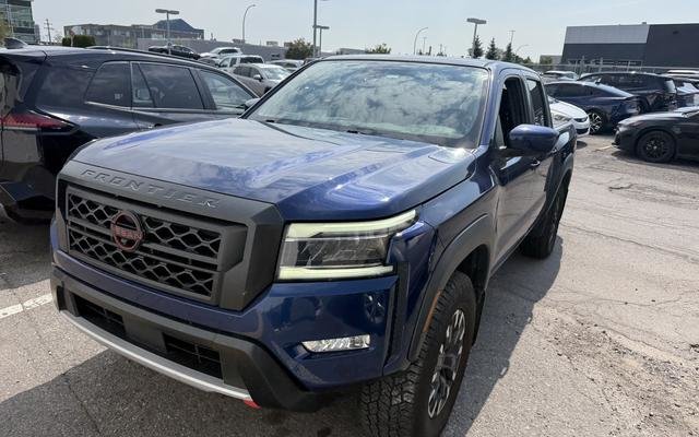 Blue 2023 Nissan Frontier Pickup Truck Four-Wheel Drive Automatic