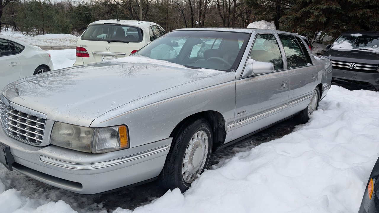 Silver 1999 Cadillac DeVille Sedan Front-Wheel Drive Automatic