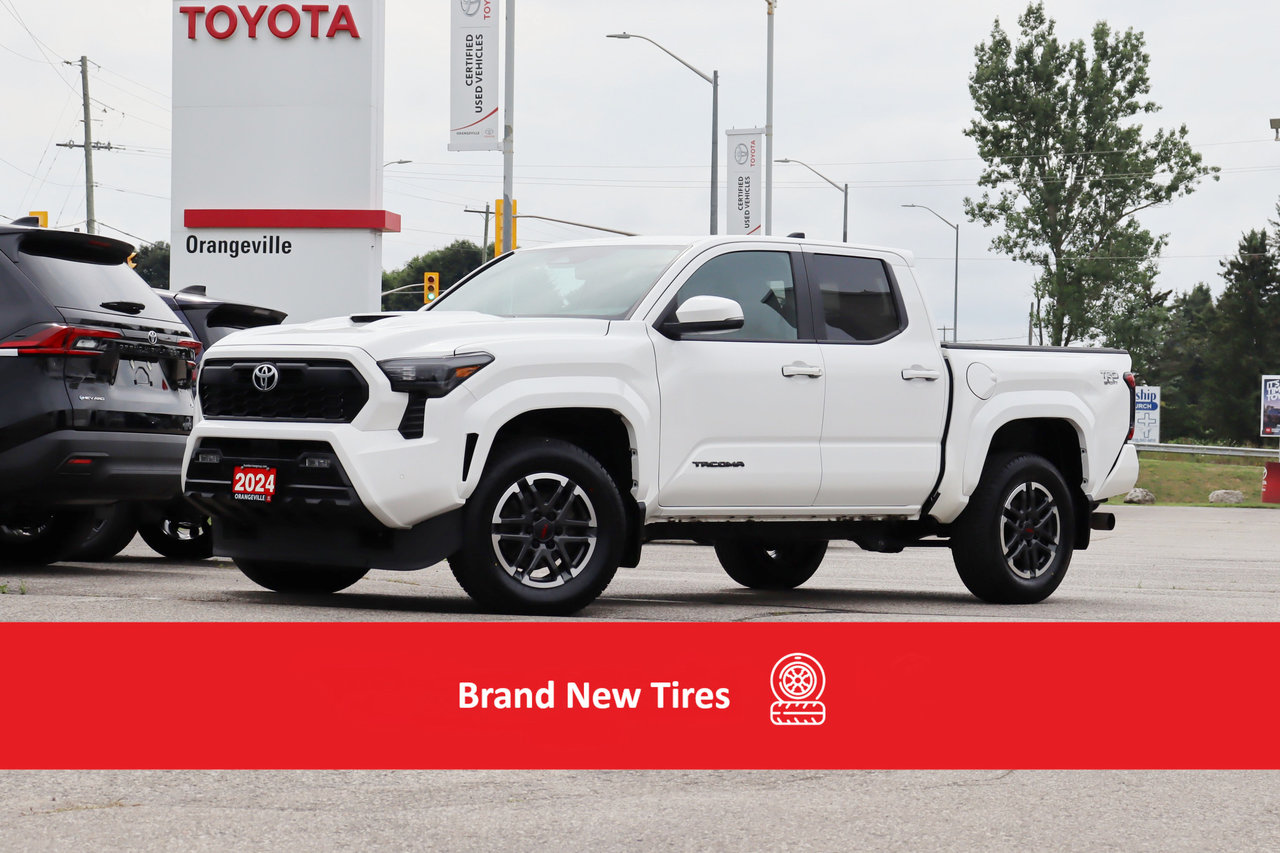 White 2024 Toyota Tacoma Pickup Truck Four-Wheel Drive Manual