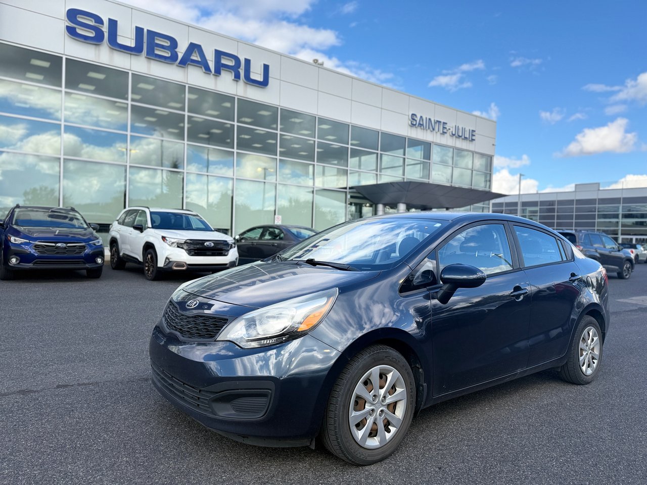 Gray (Graphite Pearl) 2014 Kia Rio Sedan Front-Wheel Drive