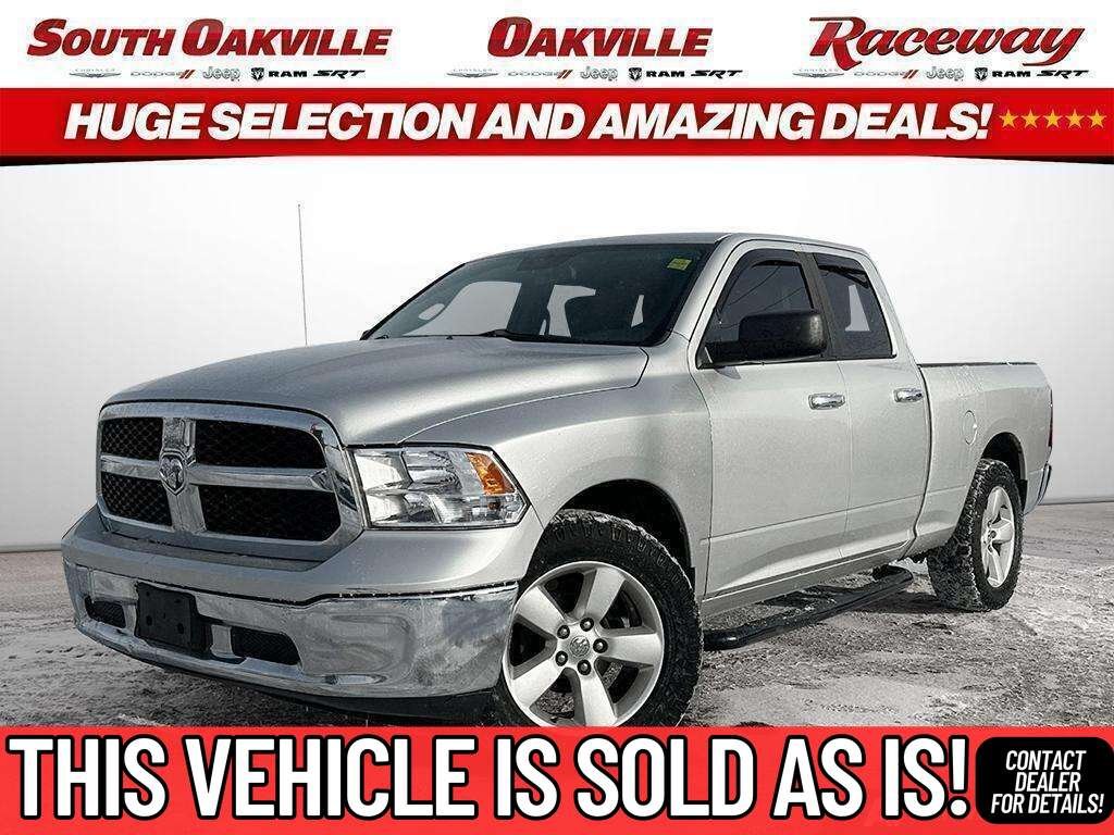 Silver 2015 RAM 1500 Pickup Truck Four-Wheel Drive Automatic