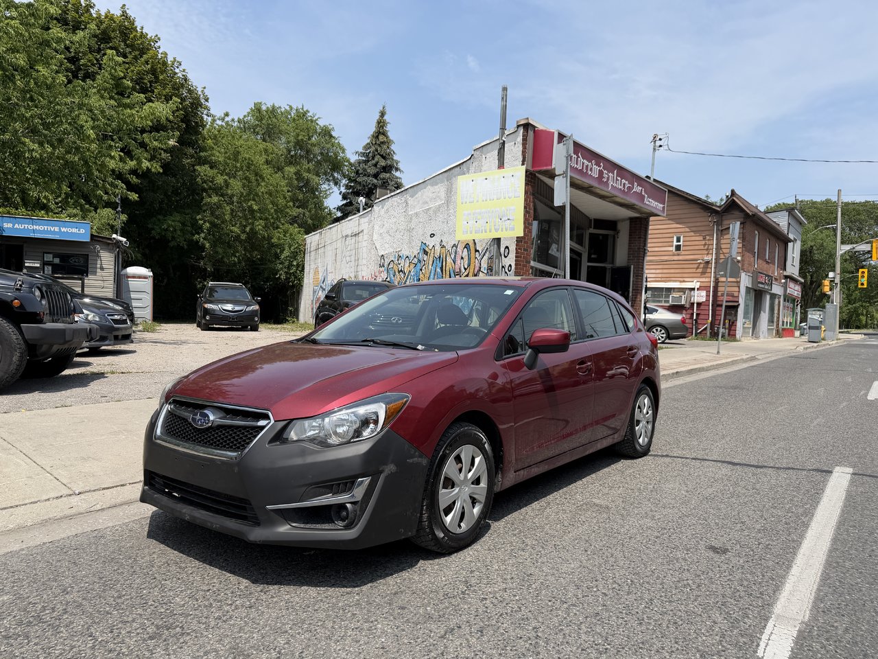 Red 2016 Subaru Impreza Hatchback All-Wheel Drive Manual