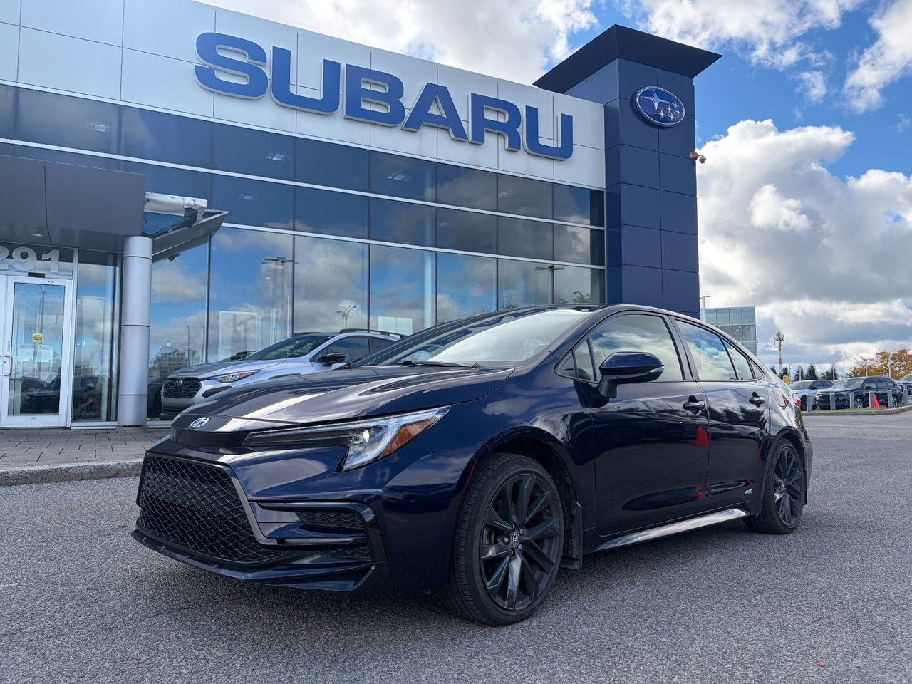Blue 2024 Toyota Corolla Hybrid Sedan All-Wheel Drive Continuously Variable Transmission