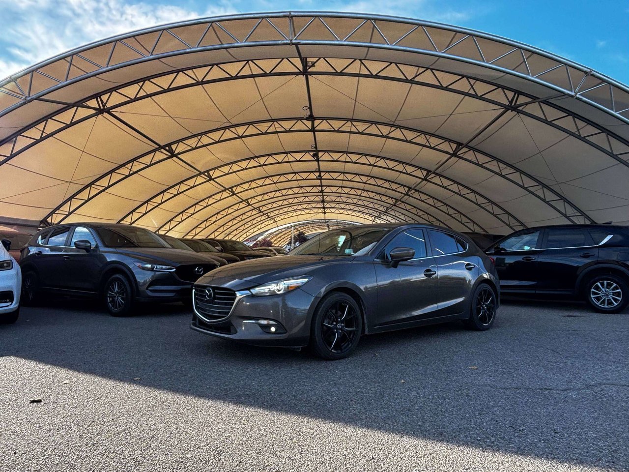 Gray (Machine Grey Metallic) 2017 Mazda MAZDA3 Sport Hatchback Manual