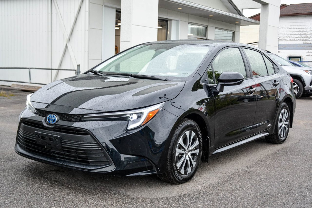 Black (0218 NOIR) 2025 Toyota Corolla Hybrid Sedan All-Wheel Drive Automatic