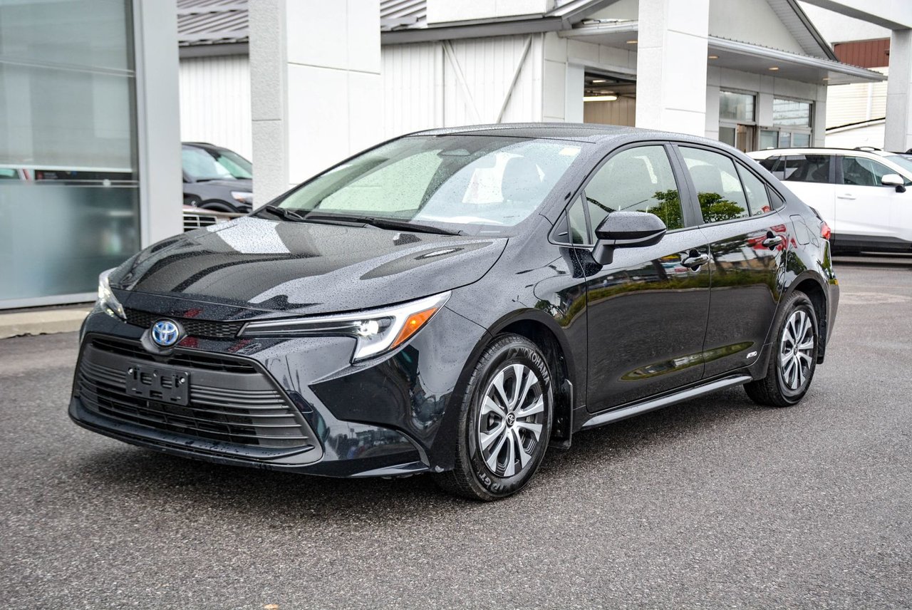 Black (0218 NOIR) 2025 Toyota Corolla Hybrid Sedan All-Wheel Drive Automatic