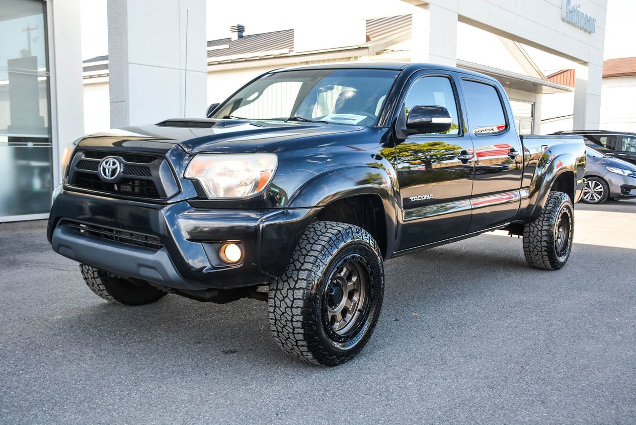 Black (0202 NOIR) 2014 Toyota Tacoma Pickup Truck Four-Wheel Drive Automatic