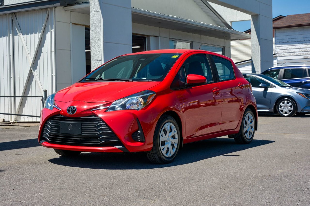 Red 2019 Toyota Yaris LE 4-Door Hatchback FWD Hatchback Automatic