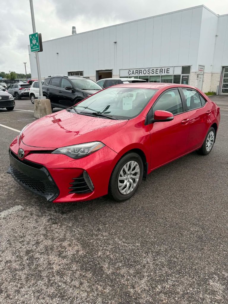 Red 2017 Toyota Corolla Sedan Front-Wheel Drive Manual