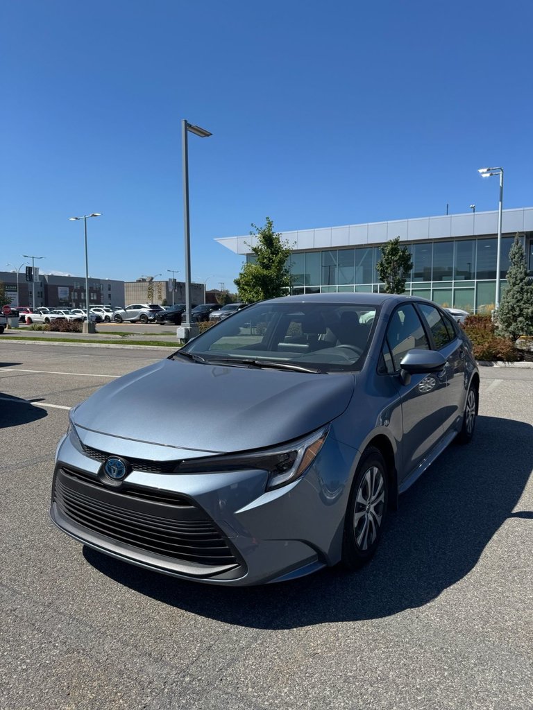 Blue 2025 Toyota Corolla Hybrid Sedan All-Wheel Drive