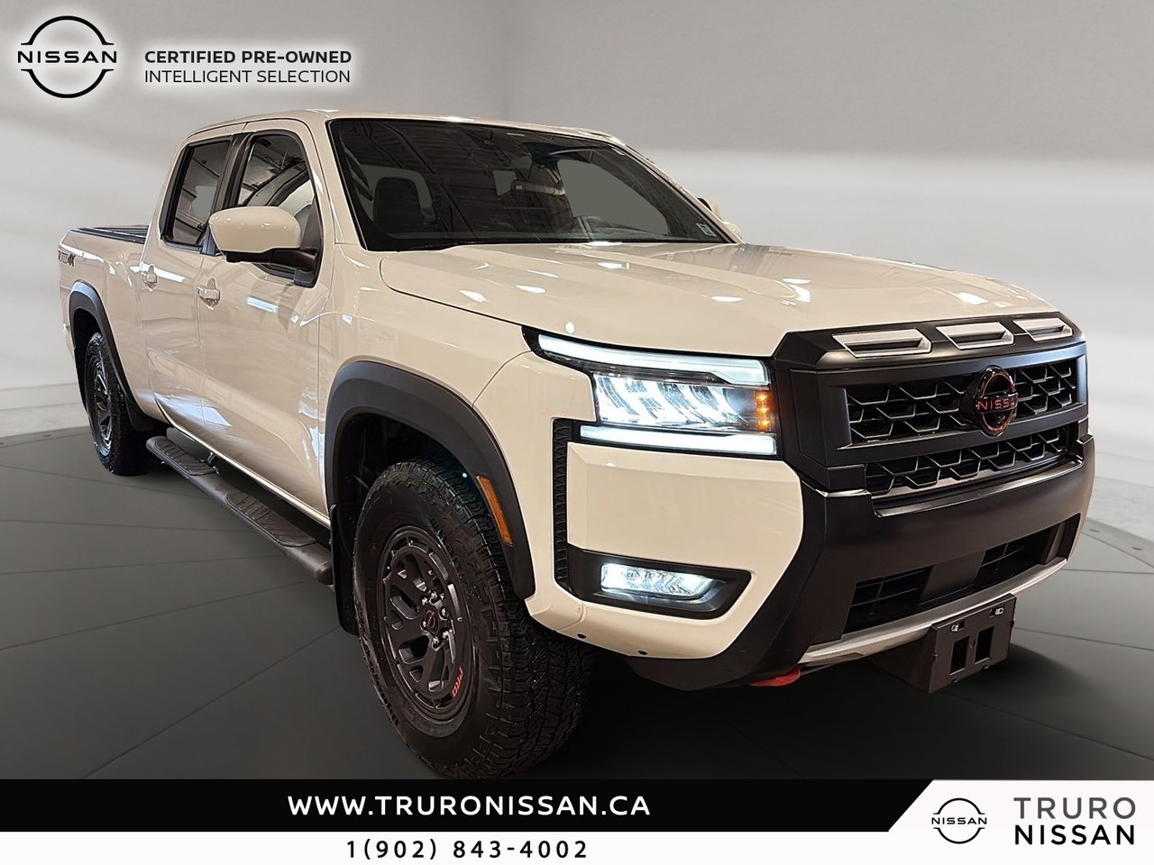 White 2025 Nissan Frontier Pickup Truck Four-Wheel Drive 9-Speed Automatic