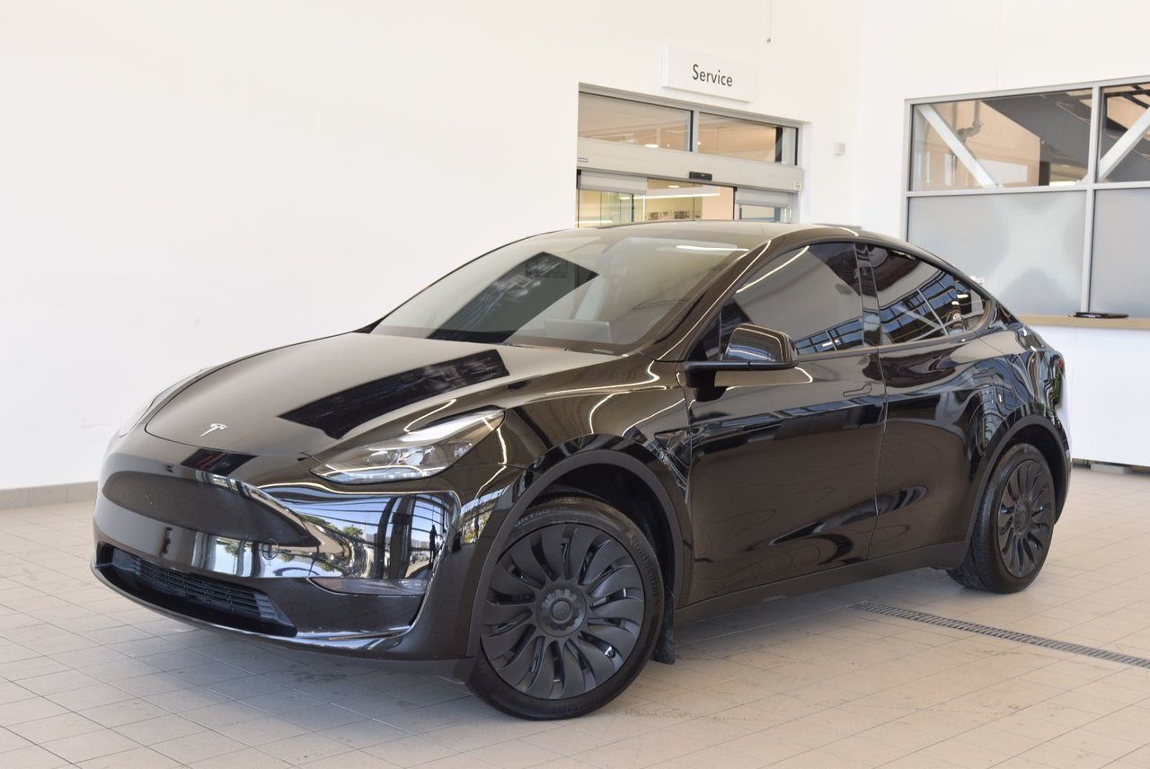 Black 2024 Tesla Model Y   Automatic