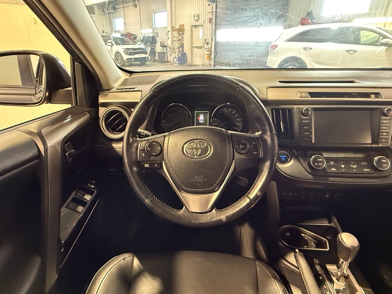 Toyota RAV4 hybride LIMITED AWD 2016-15