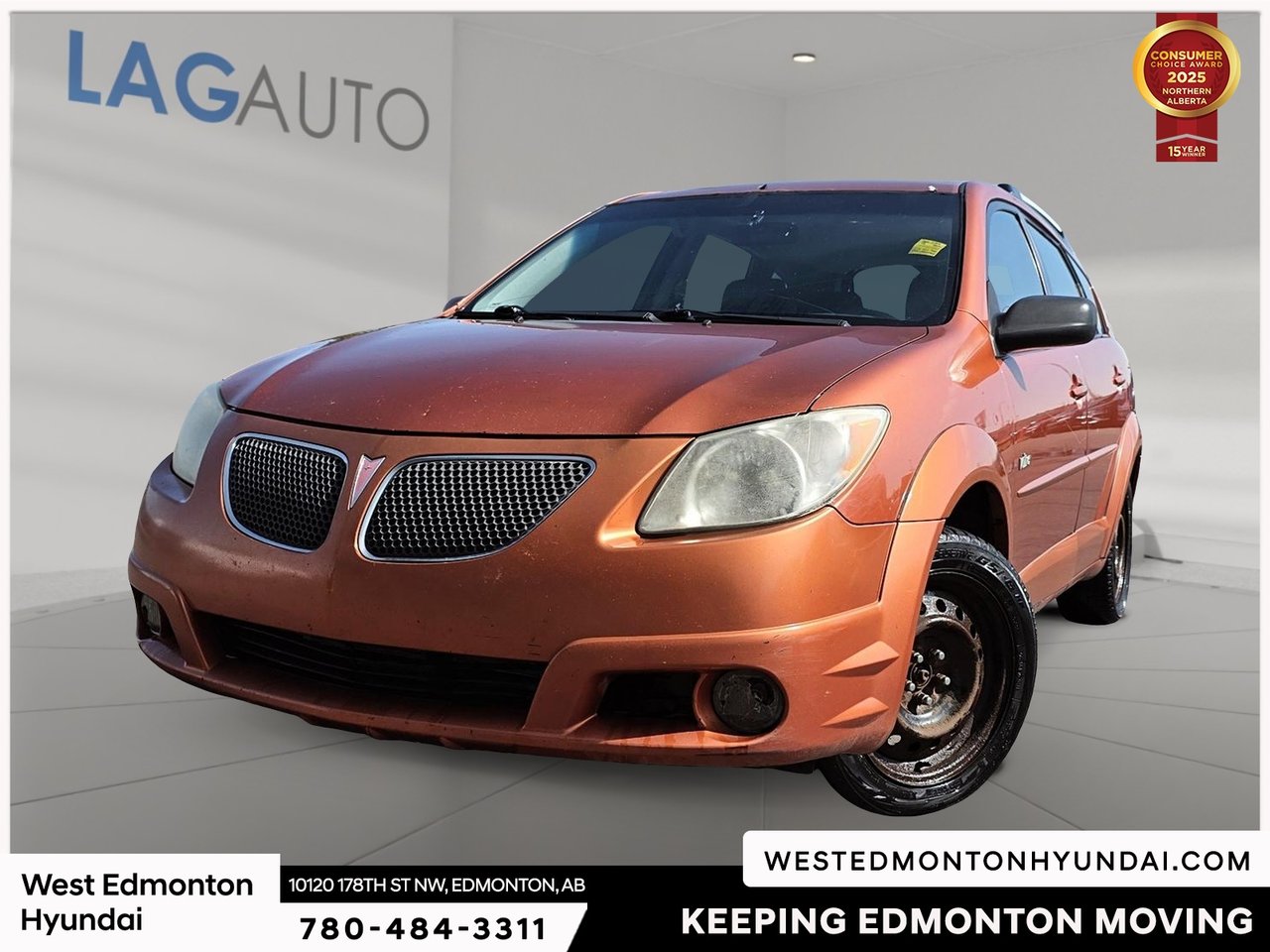 Orange 2005 Pontiac Vibe Hatchback Front-Wheel Drive Automatic