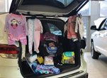 Infant Food Bank Filling Car Seats and Edgar Burton Food Drive