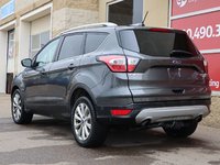 2018 Ford Escape TITANIUM IN GREY EQUIPPED WITH A 2.0L TURBO I4 , 4WD , 6SPD AUTO ,  LEATHER , PANO ROOF, NAV, REMOTE START , PREMIUM AUDIO , DUA-5