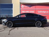 2014 Ford Fusion SE IN BLACK EQUIPPED WITH A 2.0L ECOBOOST I4 , AWD , 6SPD AUTO , LEATHER HEATED SEATS , BLUETOOTH , SW CONTROLS , SUNROOF , 18IN-6
