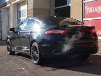 2014 Ford Fusion SE IN BLACK EQUIPPED WITH A 2.0L ECOBOOST I4 , AWD , 6SPD AUTO , LEATHER HEATED SEATS , BLUETOOTH , SW CONTROLS , SUNROOF , 18IN-7