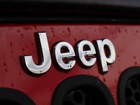 2018 Jeep WRANGLER JK UNLIMITED UNLIMITED SAHARA IN FIRECRACKER RED EQUIPPED WITH A 3.6L V6 , 4X4 , 5SPD AUTO , REMOTE START , AC , HEATED FRONT SEATS , NAV , C-2