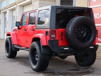 2018 Jeep WRANGLER JK UNLIMITED UNLIMITED SAHARA IN FIRECRACKER RED EQUIPPED WITH A 3.6L V6 , 4X4 , 5SPD AUTO , REMOTE START , AC , HEATED FRONT SEATS , NAV , C-7