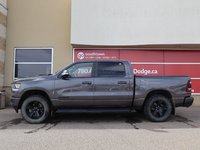 2022 Ram 1500 SPORT IN GRANITE METALLIC EQUIPPED WITH A 5.7L HEMI V8 , 4X4 , 8SPD AUTO , SPORT HOOD , SIDE STEPS , TRI FOLD TONNEAU , LVL 2 EQ-6