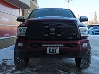 2017 Ram 2500 LIMITED MEGA CAB IN RED PEARL EQUIPPED WITH A 6.7L CUMMINS TURBO DIESEL I6 , 4X4 , 6SPD AUTO , REAR AUTO LVL AIR SUSPENSION , SU-1