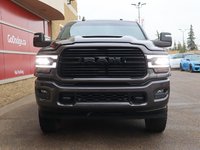2023 Ram 2500 LARAMIE MEGA CAB NIGHT EDITION IN GRANITE CRYSTAL EQUIPPED WITH A 6.7L CUMMINS TURBO DIESEL I6 , 4X4 , 6SPD AUTO , SUNROOF , LAR-1