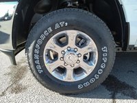 2024 Ram 2500 BIG HORN IN BRIGHT WHITE EQUIPPED WITH A 6.4L HEMI V8 , 4X4 , 8SPD AUTO , 18INCH RIMS , ALPINE UADIO , LVL 2 EQUIPMENT GROUP , O-5