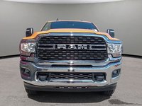 2024 Ram 3500 BIG HORN IN OMAHA ORANGE EQUIPPED WITH A 6.7L CUMMINS HO TURBO DIESEL I6 , 4X4 , 6SPD AISIN HD AUTO , 12INCH W/NAV , ALPINE AUDI-1