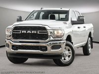2024 Ram 3500 TRADESMAN IN BRIGHT WHITE EQUIPPED WITH A 6.7L CUMMINS TURBO DIESEL I6 , 4X4 , 6SPD AUTO , DUALLY , TRAILER BRAKE CONTROL , 8.4I-0