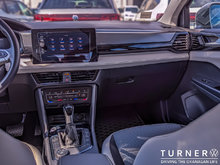 2025 Volkswagen Taos TRENDLINE FORMER TURNER SERVICE LOANER / ALL WHEEL DRIVE / SHAWDOW BLUE INTERIOR