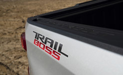 Comparison between the 2024 Chevrolet Silverado Custom Trail Boss and the LT Trail Boss