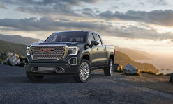 Comparison between the 2024 GMC Sierra Denali  and the 2024 GMC Sierra Denali Ultimate