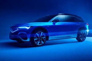 2025 Acura ZDX Beauty Shot Side View Blue Lighting