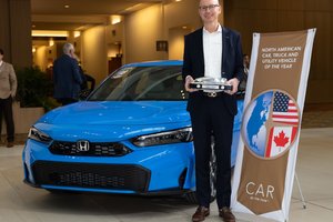 Honda Executive Stands With 2025 North American Car Of The Year