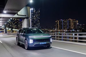 Hyundai IONIQ 9 On A Bridge Driving At Night